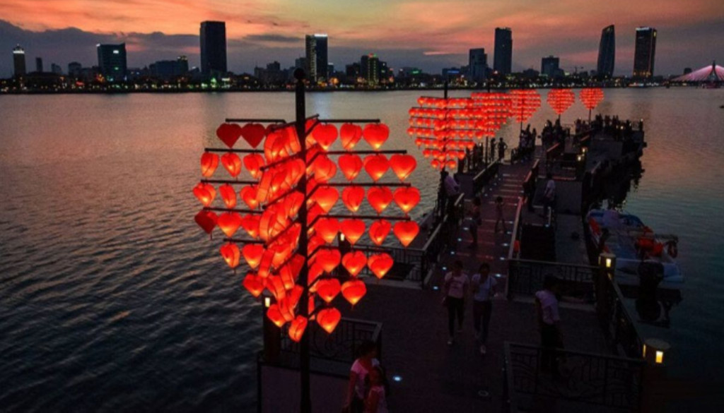 Lantern-lit rail with colorful love locks
