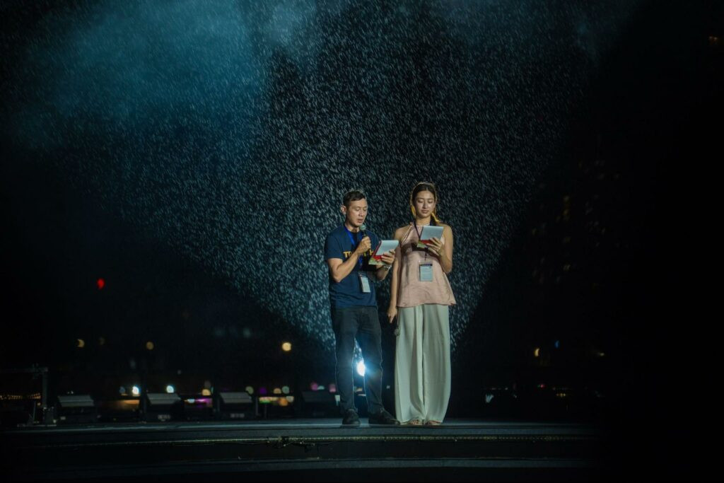 Performers fine-tune choreography under the lights